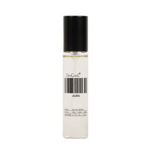 A clear cylindrical perfume bottle with a black cap, containing a very pale liquid. The bottle has a white label with a barcode and the text 'DedCoolt' and 'AURA'.