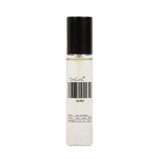 A clear cylindrical perfume bottle with a black cap, containing a very pale liquid. The bottle has a white label with a barcode and the text 'DedCoolt' and 'AURA'.
