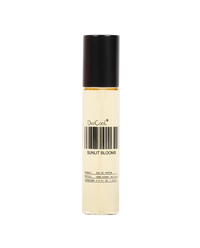 A clear cylindrical rollerball bottle with a black cap, containing a pale yellow liquid. The label reads 'DeeCool' and 'SUNLIT BLOOMS' with a barcode graphic, set against a plain white background.